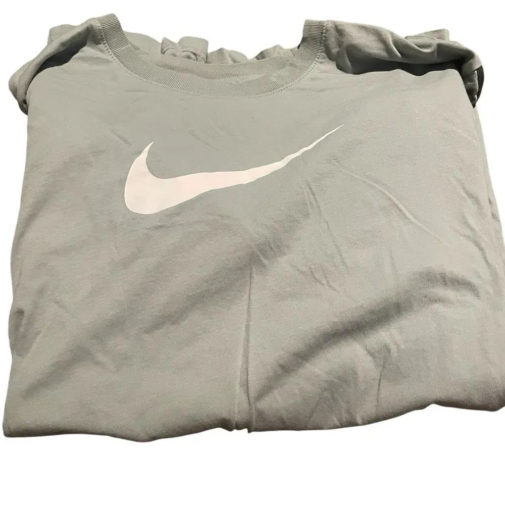 Nike Light Gray Tee with White Swoosh size medium like new see pics